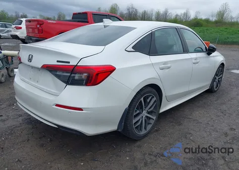 2022 Honda Civic Touring from USA, damaged, VIN 2HGFE1F9XNH306361